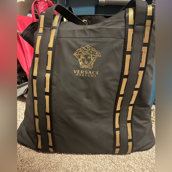 Versace Handbags - Versace parfums tote bag + protector